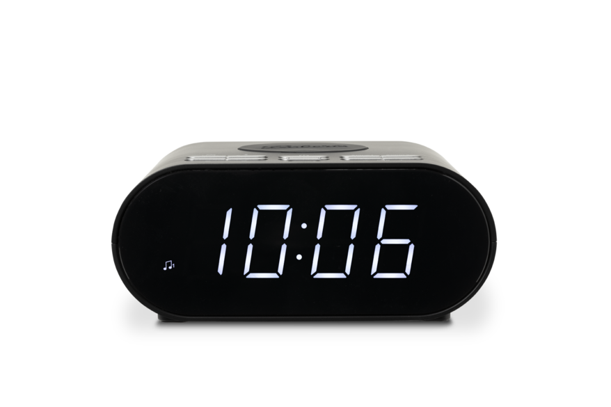 Black digital clock with white display on a white background