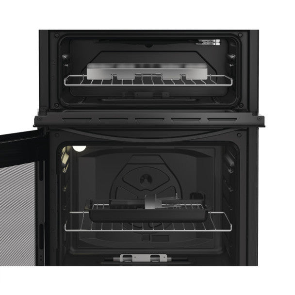 Black double oven with open doors