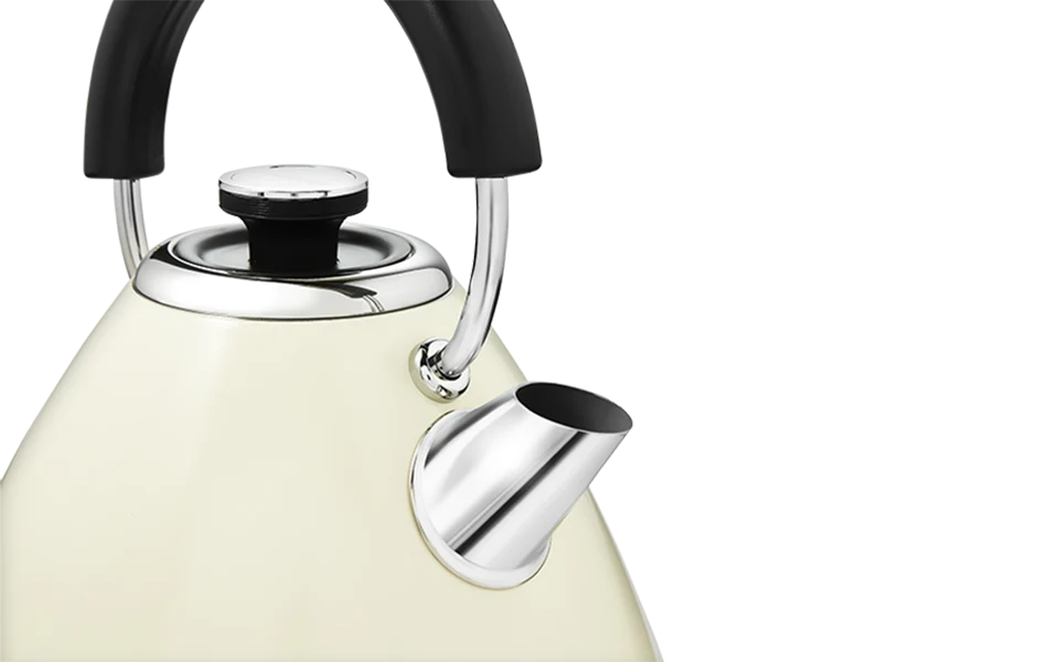 White kettle with black handle on a white background