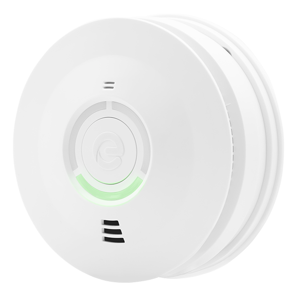 White smoke detector with a green light on a white background