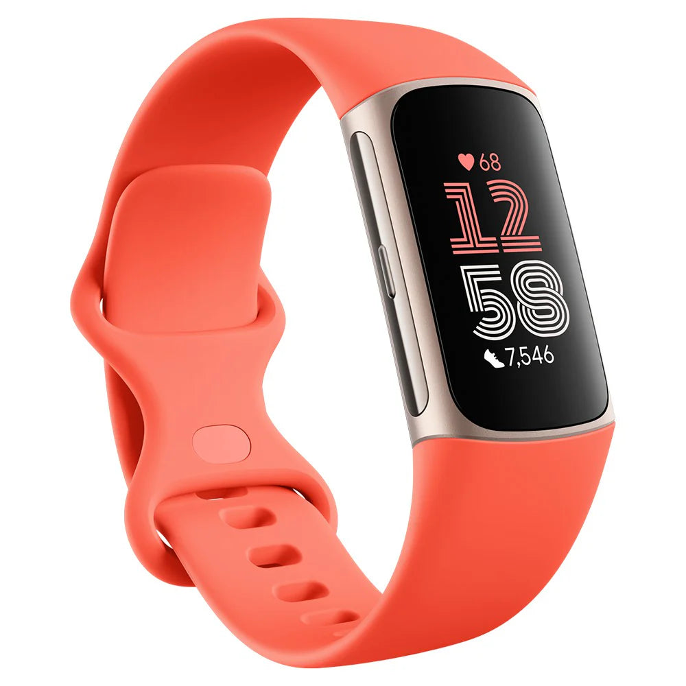 A red Fitbit Charge 6 fitness tracker