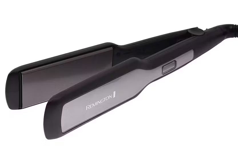 Black Remington hair straightener on a white background