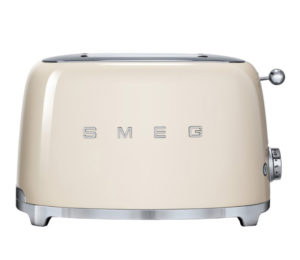 Cream-colored toaster with 'Smeg' branding 
