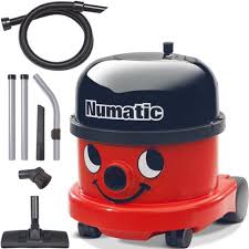 Numatic vacuum cleaner with attachments on a white background