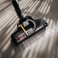 Vacuum cleaner head on a carpet