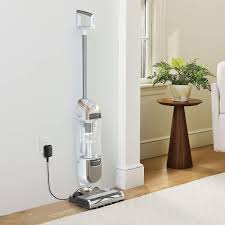 Vacuum cleaner on a wooden floor