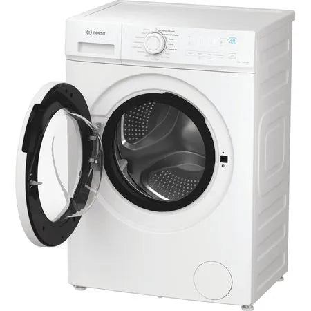 White washing machine with open door on a white background